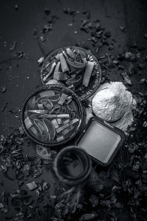 Herbal and organic face pack of aloevera gel,honey,rose water, and fuller's earth or multani mitti or mulapani mitti on wooden surface with all the ingredients used to cleanse your pores,Close up viewの写真素材