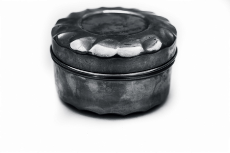 Close up of small steel container or lunch box isolated on white.の写真素材