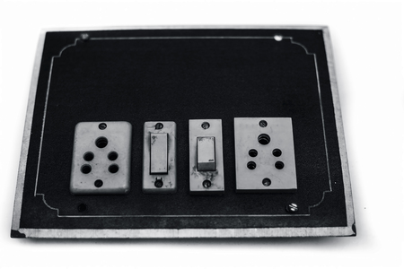 Close up of blue and white colored switch board or Electric switchboard isolated on white.