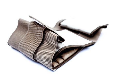 Close up of medical heat waist belt for lower back pain or back pain isolated on white used by both...