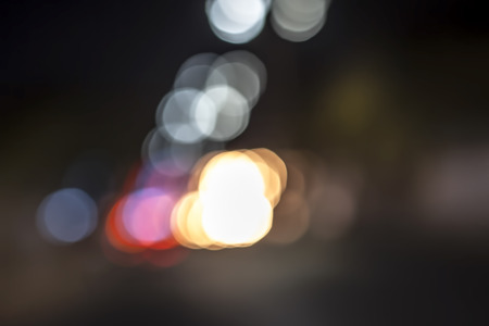 Close up of bokeh background of traffic lights during sunset.の写真素材