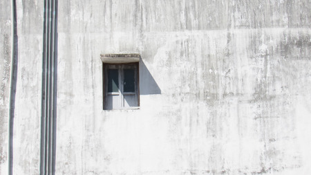 Minimalistic shot of window with its reflection along with background of blue sky.の写真素材
