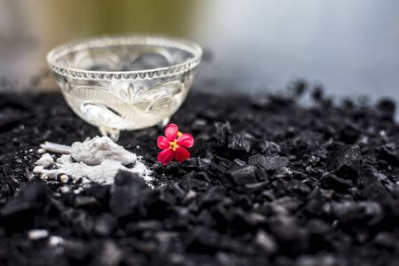Activated charcoal well mixed with baking soda to detoxify strands and scalp, restore shine, repair...
