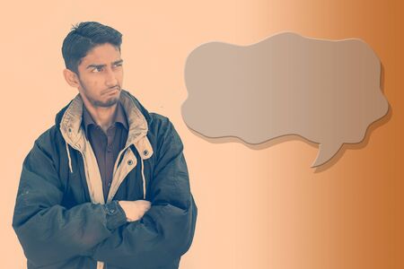 Close up of young tired lazy caucasian male isolated on a gradient with some chat or bubble icon...