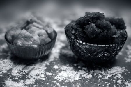 Close up of Indian Gujarati popular dish Atte ka sheera or Halwa-Karah parshad in a glass bowl on a...