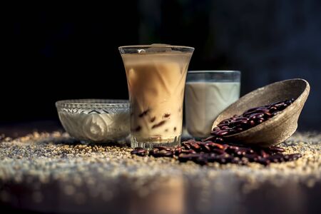 Red bean smoothie or kidney beans smoothie in a glass along with some red bean paste, banana,...