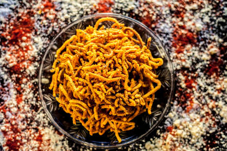 Close up shot of Gujarati famous tea-time snack dish Bhavnagiri gathiya in a serving plate. Shot of...