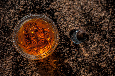 Close up shot of a glass of brandy on a black backgroundの写真素材