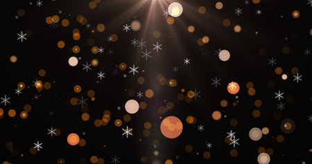 Christmas Background with Gold Particles | Falling White Bokeh and Glitter Lightsの写真素材