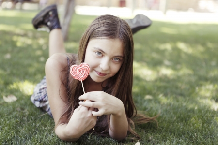  Girl with colouring lollipopの写真素材