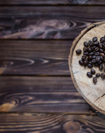 Coffee beans and old wooden background, And space add for your textの写真素材