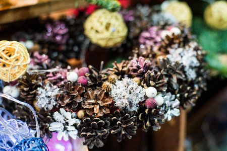Christmas decoration with candles, christmas ball, ribbon, fir cone, tree, anice star, cinamon. Wooden Background For Copy Space. Vintage Styleの写真素材