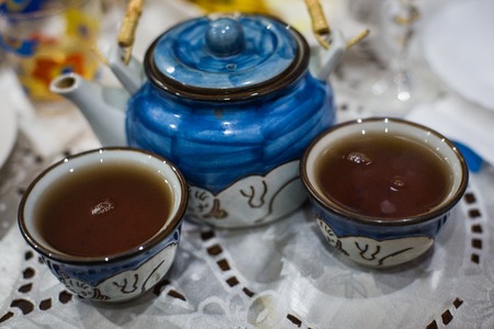 Japanese porcelain cups and kettleの写真素材