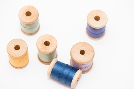 Bobbins of thread isolated on white background