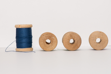 Bobbins of thread isolated on white background