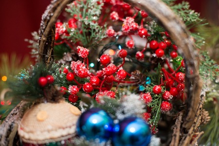 Christmas decorations, balls in a basket, garland, golden raysの写真素材