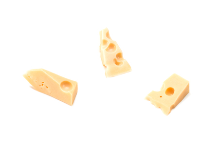 Three slices of Swiss cheese on a white backgroundの写真素材