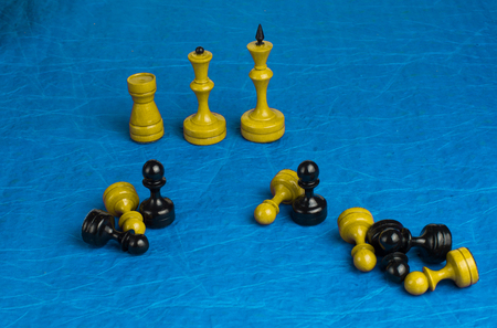 chess pieces on a paper backgroundの写真素材