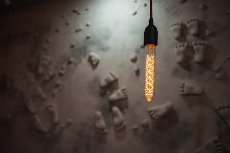 light bulb on a dark backgroundの写真素材