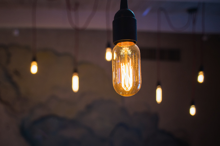 light bulb on a dark backgroundの写真素材