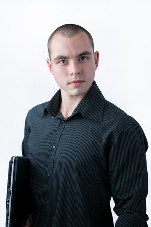 Business man with a laptopの写真素材