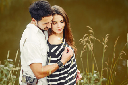 sensual romantic couple in love at the lake outdoor in summer day, beauty of nature, harmony conceptの写真素材