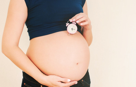 happy healthy pregnant woman anticipating baby の写真素材