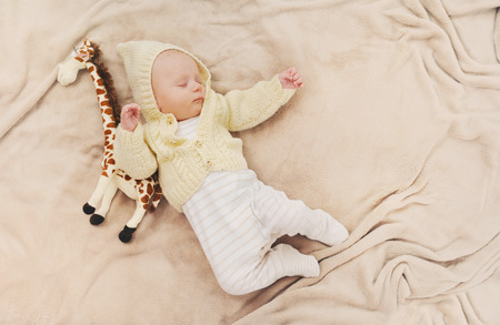 sleeping cute newborn baby, maternity concept, soft image of beautiful family