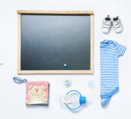 top view fashion trendy look of blackboard and baby stuff, baby fashion conceptの写真素材