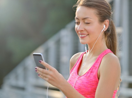 Portrait of running fitness womanの写真素材