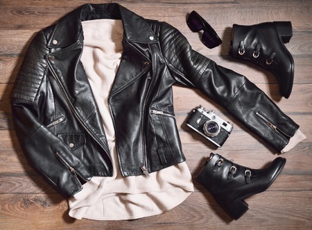 Set of stylish clothes,woman trendy fashion clothes collage on wooden background, flat lay, top view
