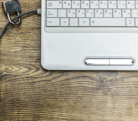 Internet security and network protection concept, padlock and connection plug on laptopの写真素材