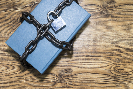 Information security concept, book with chain and padlockの写真素材