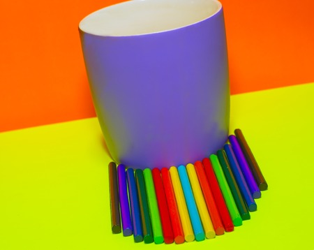 Multicolored sticks with a mugの写真素材