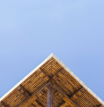 Copy space. Old design pergola arbor made wood with clear blue summer sky.