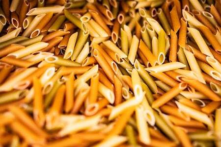 Background from many pasta. Raw pasta textureの写真素材