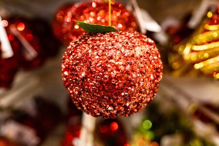 New Years holiday toy shiny ball. Christmas tree decoration redの写真素材