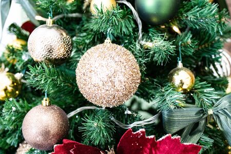Shiny Christmas balls on the Christmas tree.の写真素材