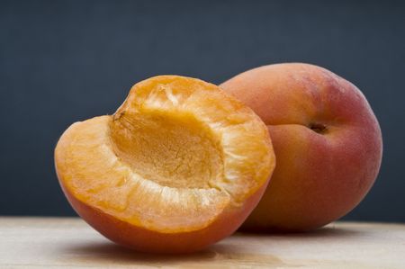Fresh apricot on blue backgroundの写真素材