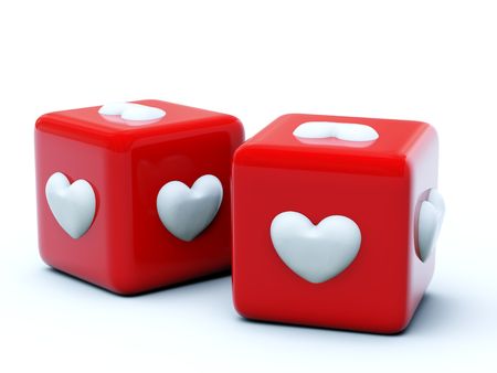 Red dice with hearts isolated on whiteの写真素材