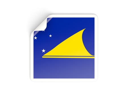 Square sticker with flag of tokelau isolated on whiteの写真素材