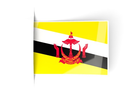 Square label with flag of brunei isolated on whiteの写真素材