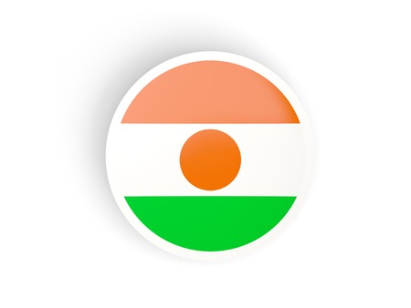 Round sticker with flag of niger isolated on whiteの写真素材