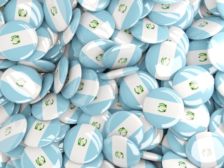 Background with round pins with flag of guatemalaの写真素材