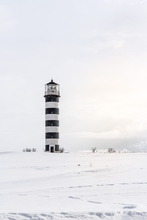 Lighthouse and fisherman willage at west coast of the Pacific oceanの写真素材