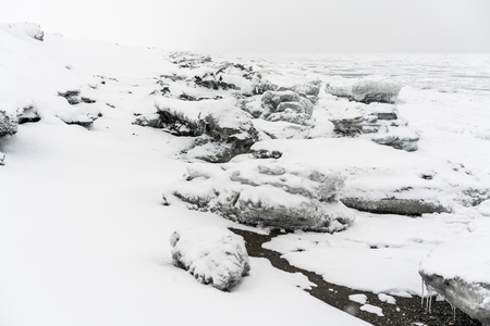 Ice at coastline of the Pacific ocean. Kamchatka peninsula