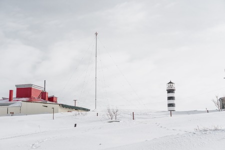 Lighthouse and fisherman willage at west coast of the Pacific ocean. Kamchatka, Russiaの写真素材