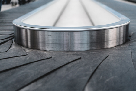 Close up of conveyor belt at the baggage claim at airportの写真素材