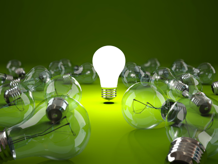 Bright light bulb on green background. 3D illustrationの写真素材
