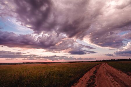 A dramatic storm clouds at sunset. Amur region, russiaの写真素材